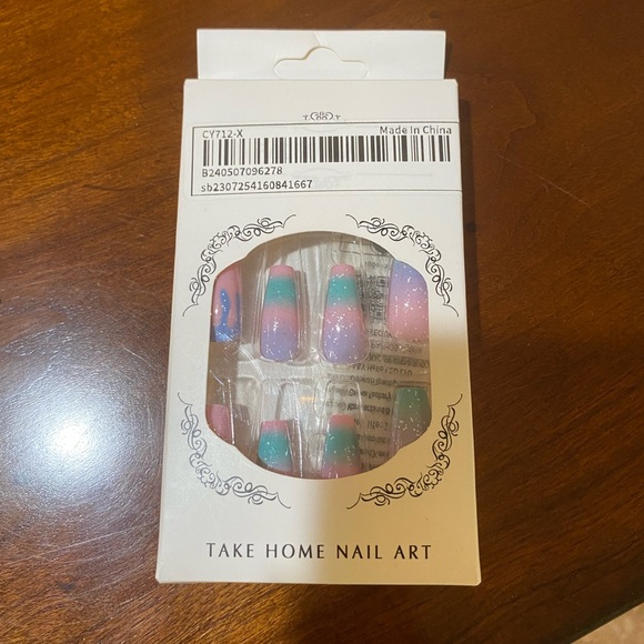 Take home nail art Other - NWT take home nail art kit includes many nails, the adhesives dual emery board